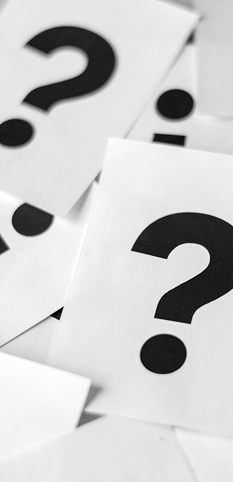 question marks on paper